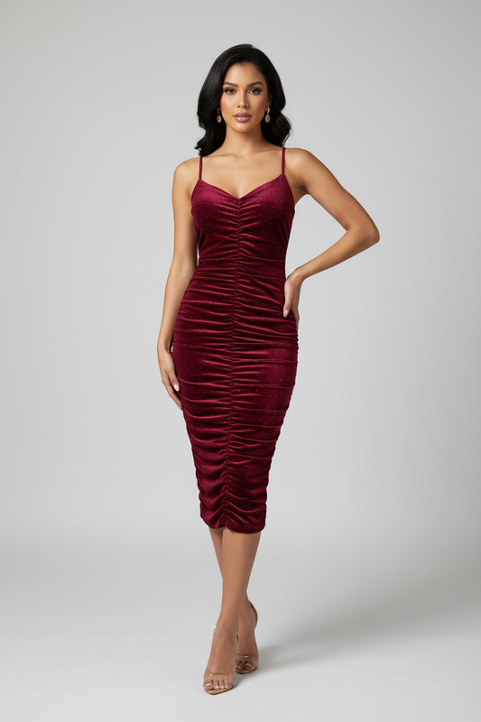 Model wearing burgundy ruched dress
